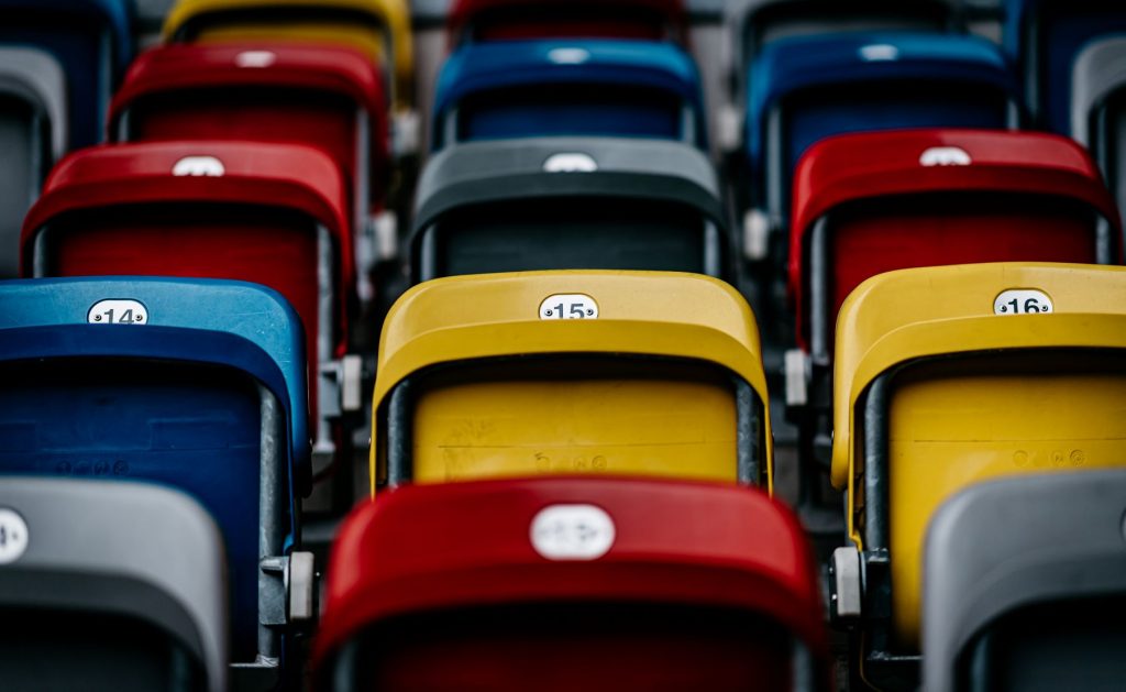 Colorful seats in a stadium.