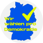 "Deutschlandkarte mit Haken und dem Schriftzug 'Wir wählen pro Demokratie'"